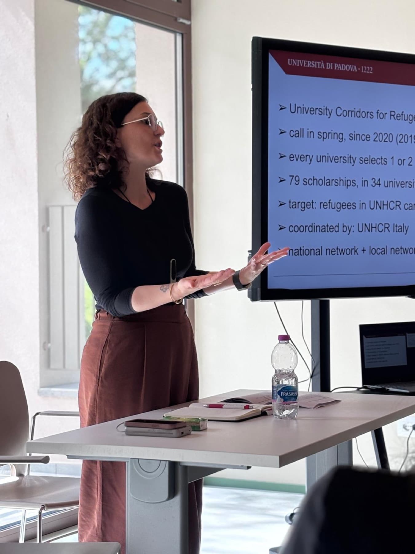 Elisa Gamba presenting university corridors for refugees